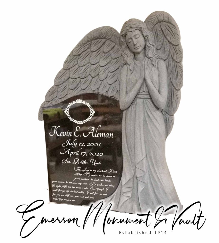 Nearly complete, this fully carved, custom angel memorial features precision-etched text and detailed photo surround.